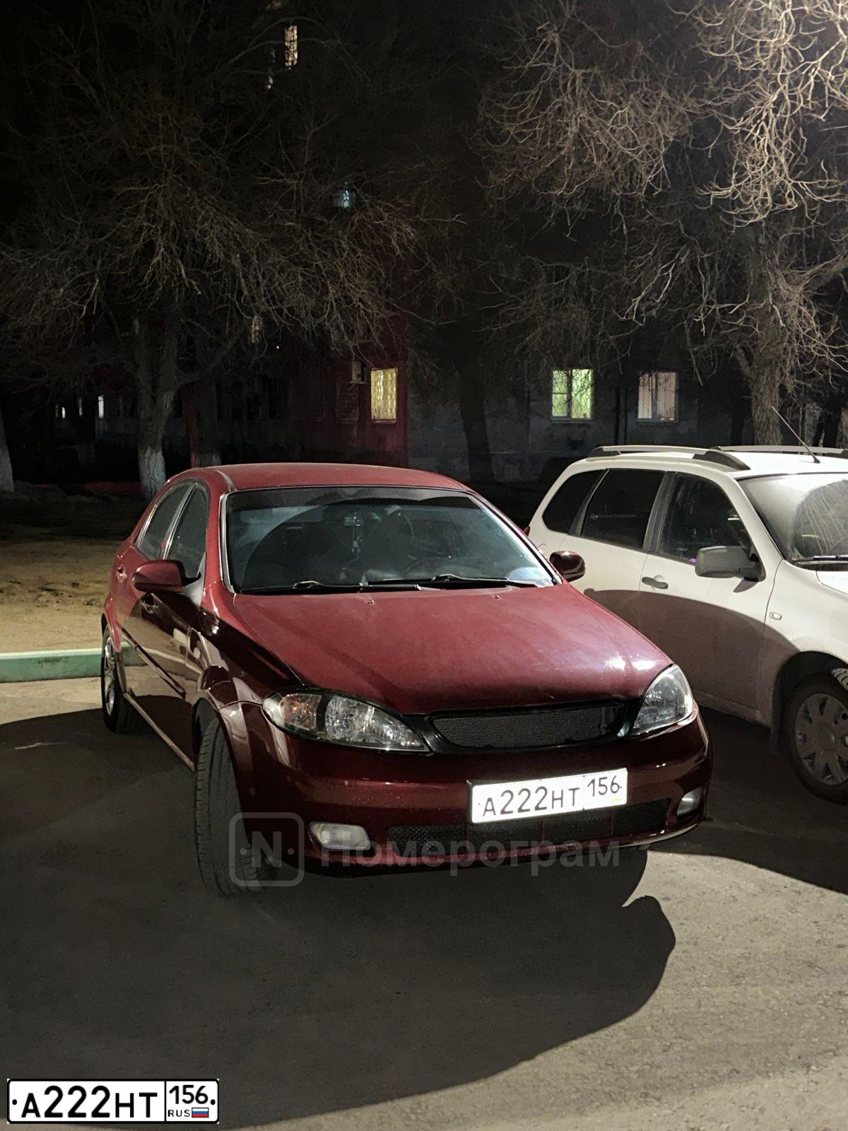 Фото автомобиля CHEVROLET LACETTI, 2008 — госномер А222НТ156. Цвет: Красный