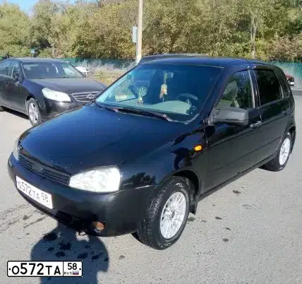 Фото автомобиля LADA 1119 KALINA, 2010 — госномер О572ТА58. Цвет: ЧЕРНЫЙ