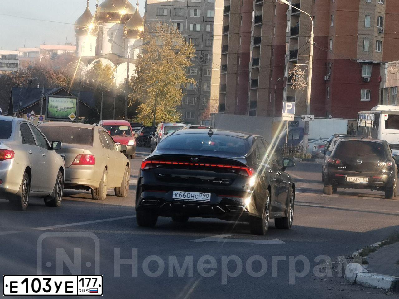 Фото автомобиля MAZDA 3, 2007 — госномер Е103УЕ177. Цвет: ЧЕРНЫЙ