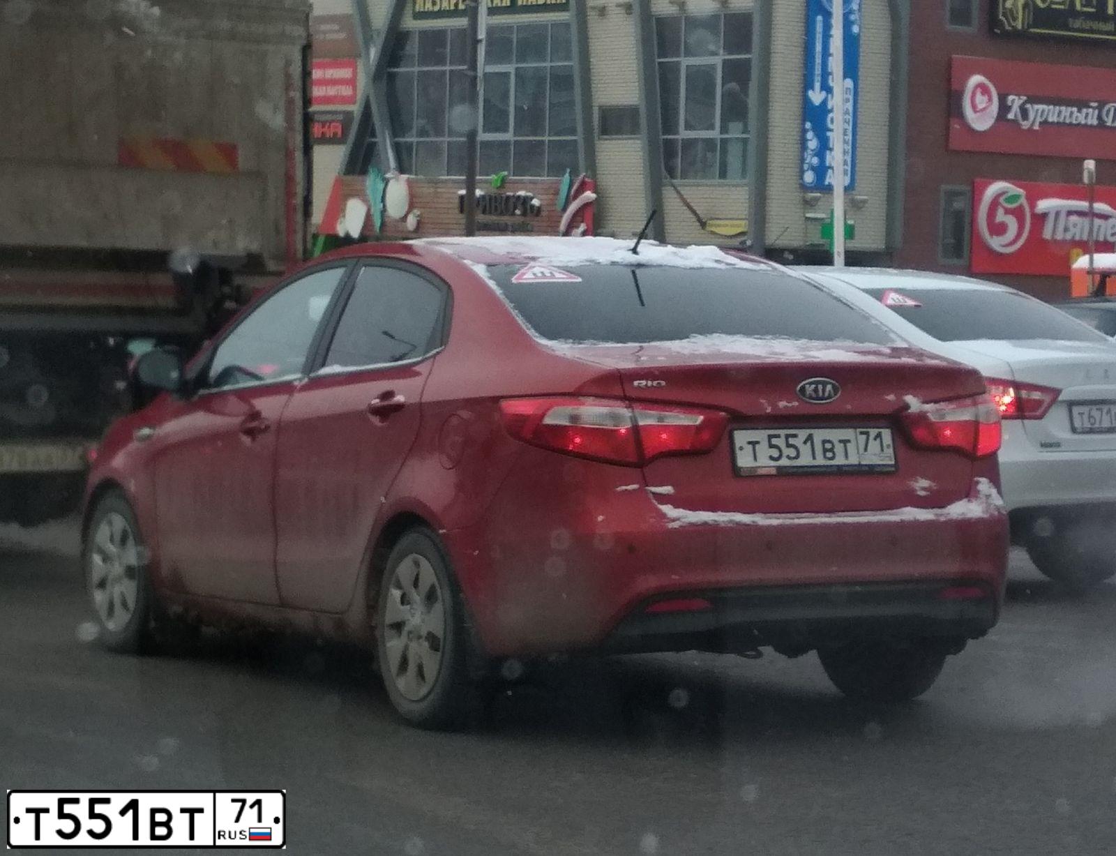 Фото автомобиля KIA RIO, 2012 — госномер В111АВ71. Цвет: Красный