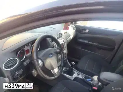 Фото автомобиля FORD FOCUS, 2008 — госномер Н339МА32. Цвет: ЧЕРНЫЙ