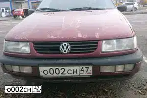 Фото автомобиля VOLKSWAGEN PASSAT, 1994 — госномер М312УС98. Цвет: ВИШНЕВЫЙ МЕТАЛЛИК
