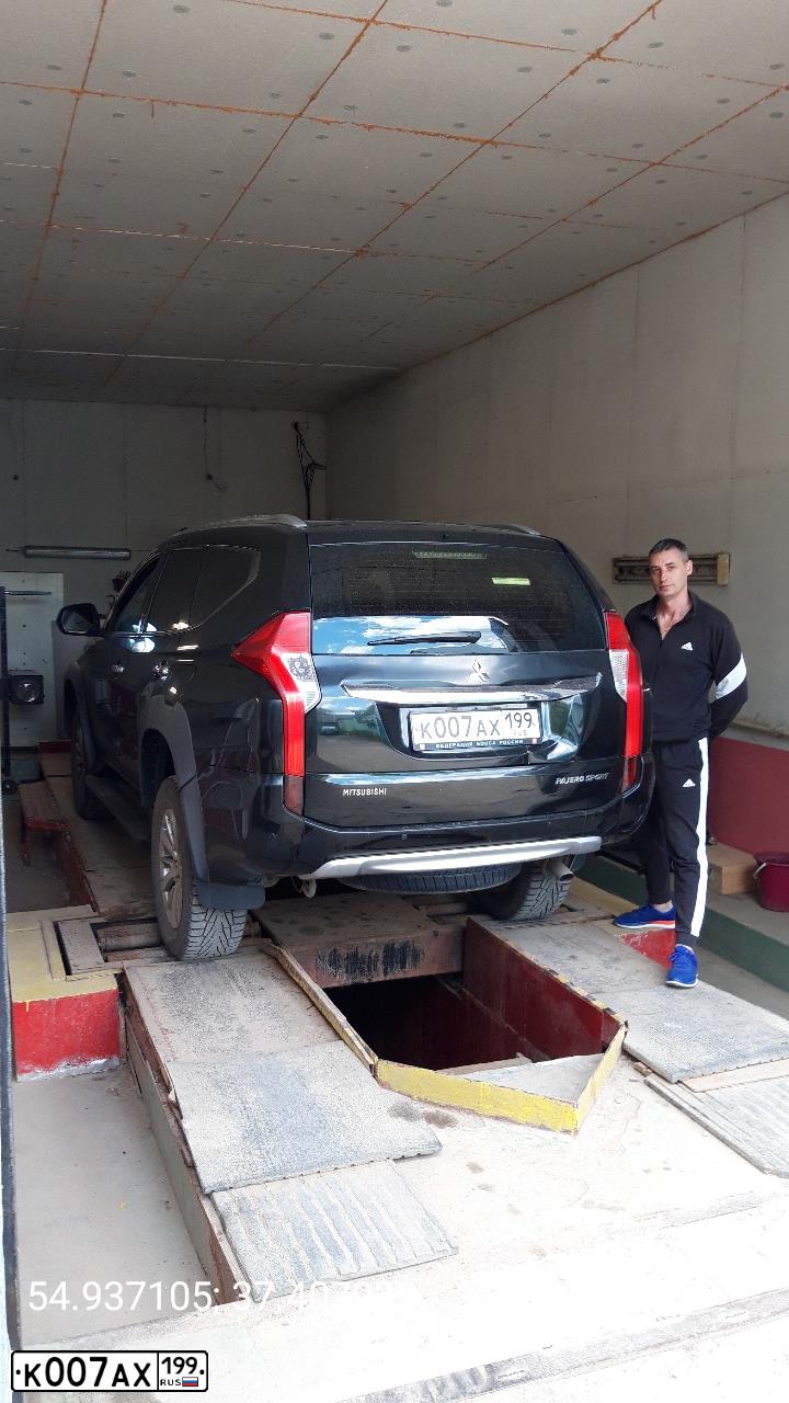 Фото автомобиля MITSUBISHI PAJERO SPORT, 2017 — госномер К007АХ199. Цвет: ЧЕРНЫЙ