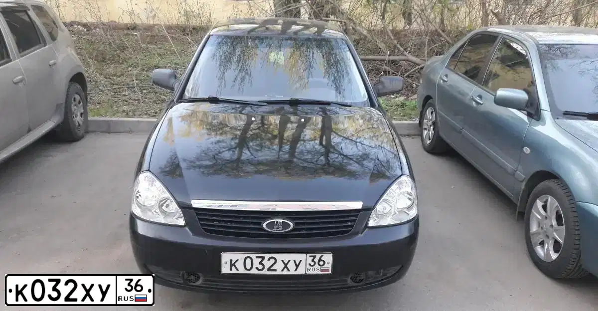 Фото автомобиля LADA 2172 PRIORA, 2009 — госномер У172СЕ36. Цвет: СИНЕ-ЧЕРНЫЙ