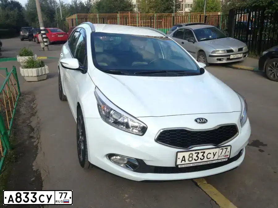Фото автомобиля KIA BONGO, 2011 — госномер В212НР06. Цвет: Белый