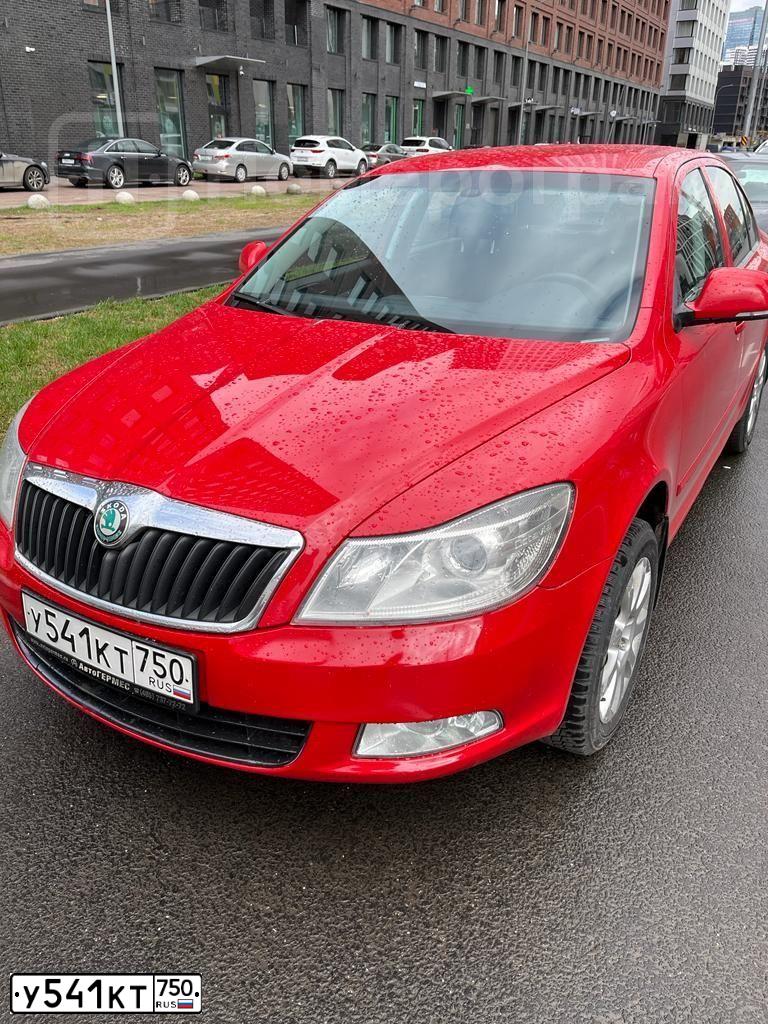 Фото автомобиля SKODA OCTAVIA, 2010 — госномер К346ОК71. Цвет: КРАСНЫЙ