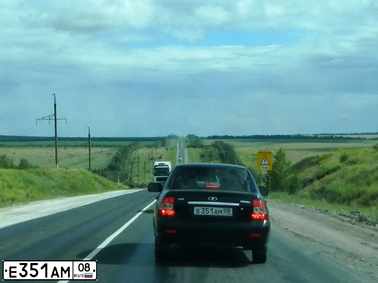 Фото автомобиля LADA 2170 PRIORA, 2013 — госномер Е796КМ126. Цвет: Сине-Черный