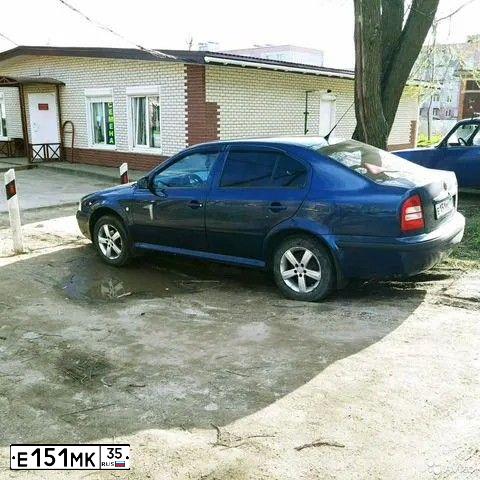 Фото автомобиля SKODA OCTAVIA, 2006 — госномер Е151МК35. Цвет: ТЕМНО-СИНИЙ