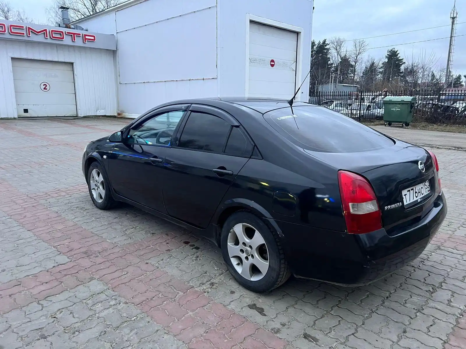 Фото автомобиля NISSAN PRIMERA, 2003 — госномер Т776НС152. Цвет: ЧЕРНЫЙ