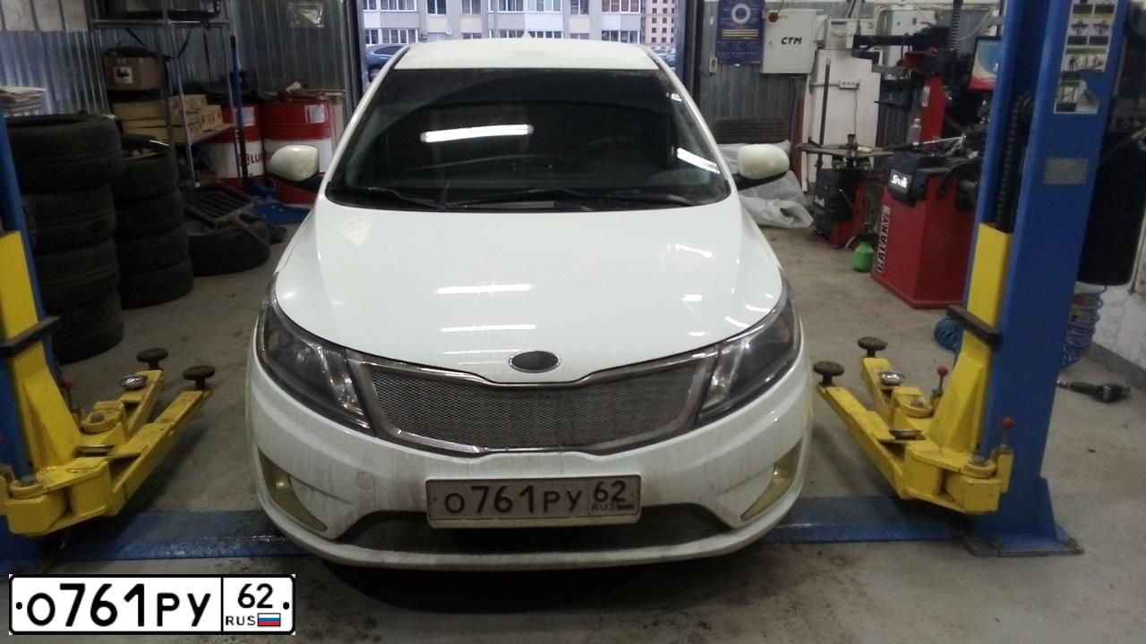 Фото автомобиля KIA RIO, 2013 — госномер О761РУ62. Цвет: Белый