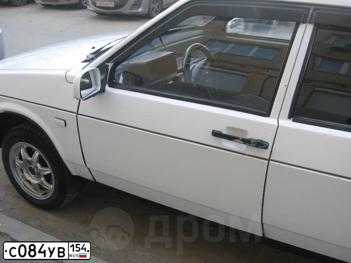 Фото автомобиля MAZDA 3, 2011 — госномер С084УВ154. Цвет: СЕРЕБРИСТЫЙ