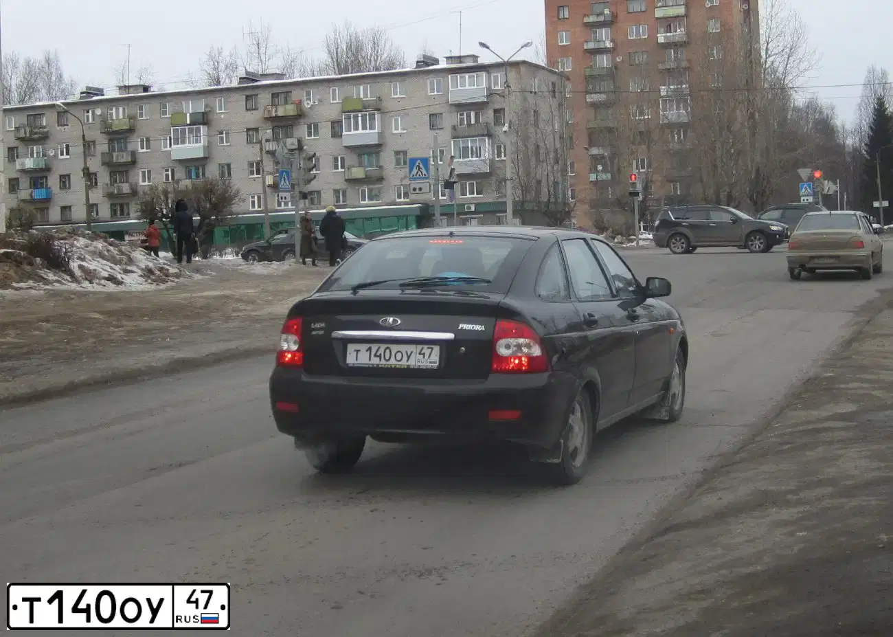 Фото автомобиля LADA 2172 PRIORA, 2010 — госномер Т140ОУ47. Цвет: ЧЕРНЫЙ