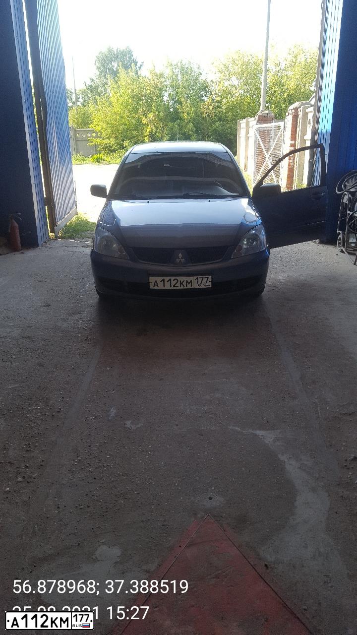 Фото автомобиля MITSUBISHI LANCER, 2006 — госномер А112КМ177. Цвет: Серый