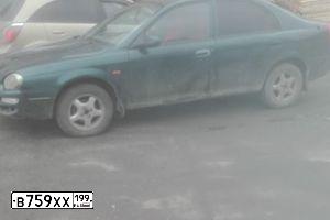 Фото автомобиля KIA SEPHIA, 1999 — госномер М488ТР799. Цвет: ЗЕЛЕНЫЙ(ТЕМНО-ЗЕЛЕНЫЙ)