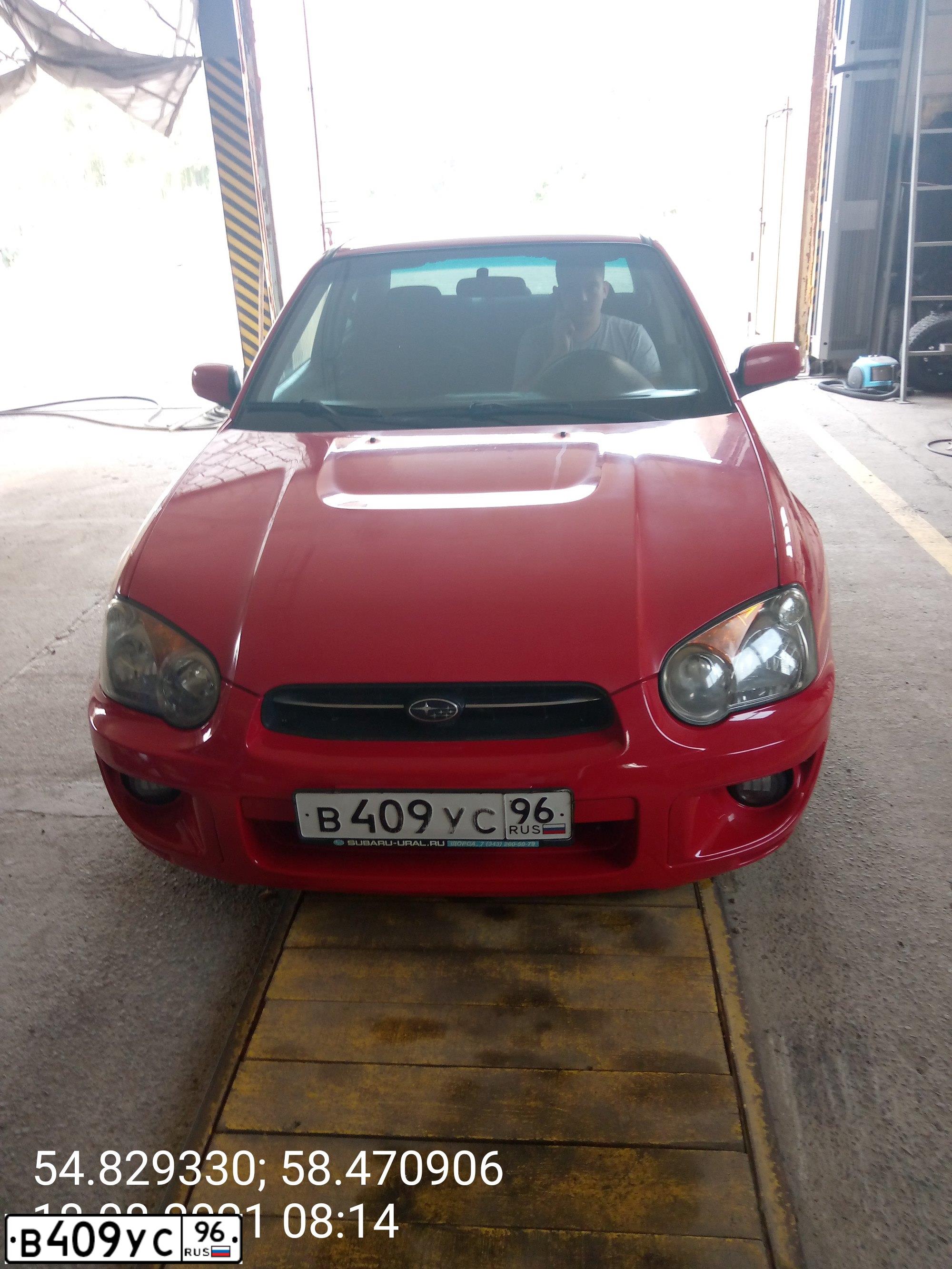 Фото автомобиля SUBARU IMPREZA, 2005 — госномер Х323ЕЕ774. Цвет: Красный