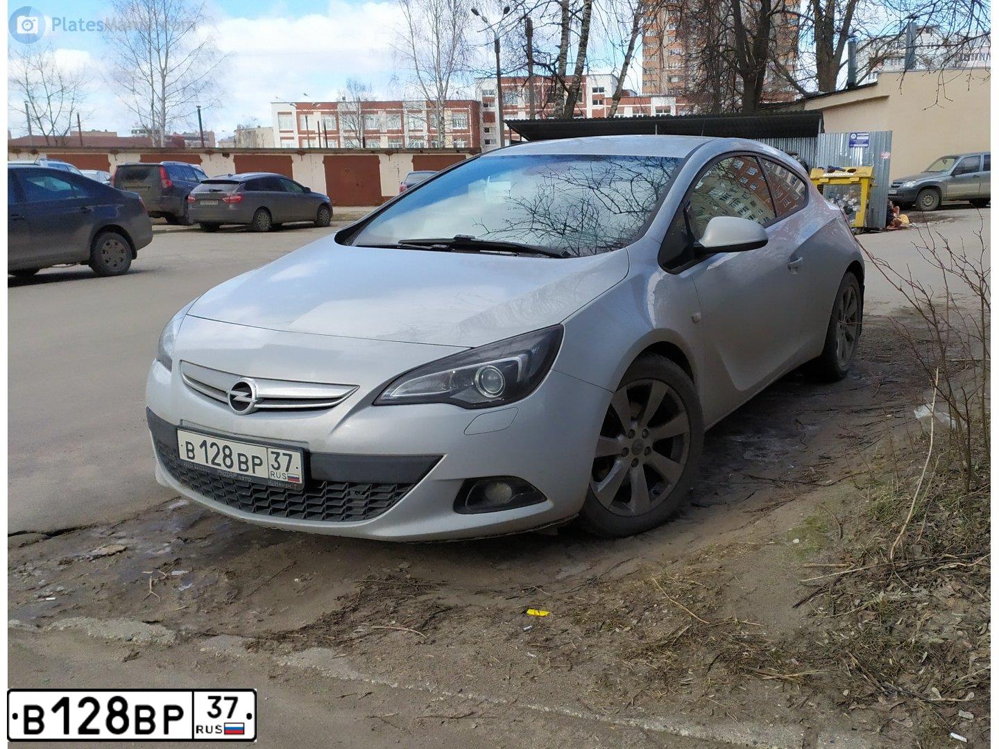 Фото автомобиля OPEL ASTRA, 2012 — госномер Н210УР76. Цвет: Белый