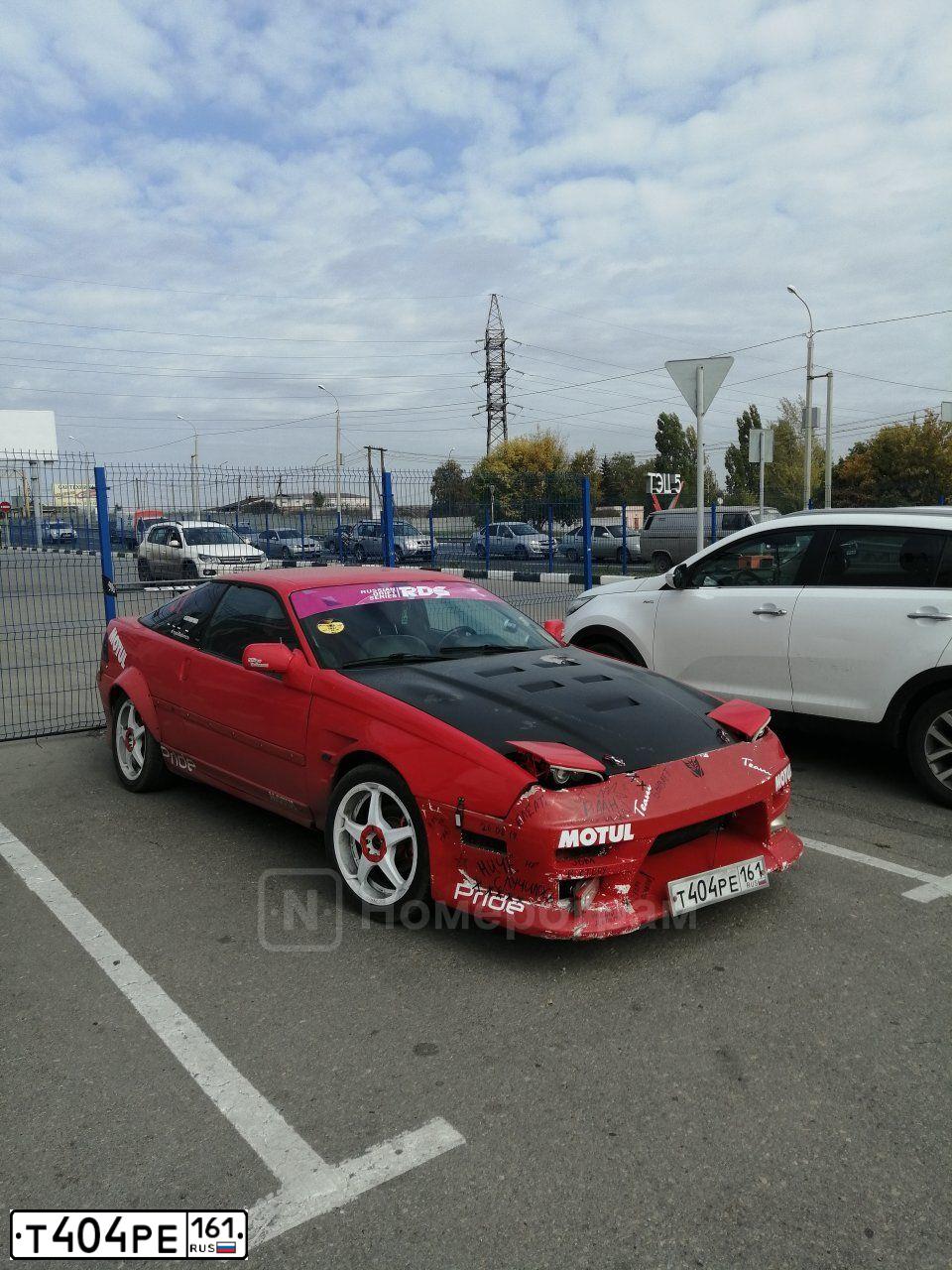 Фото автомобиля FORD PROBE, 1991 — госномер Е807АТ164. Цвет: Красный