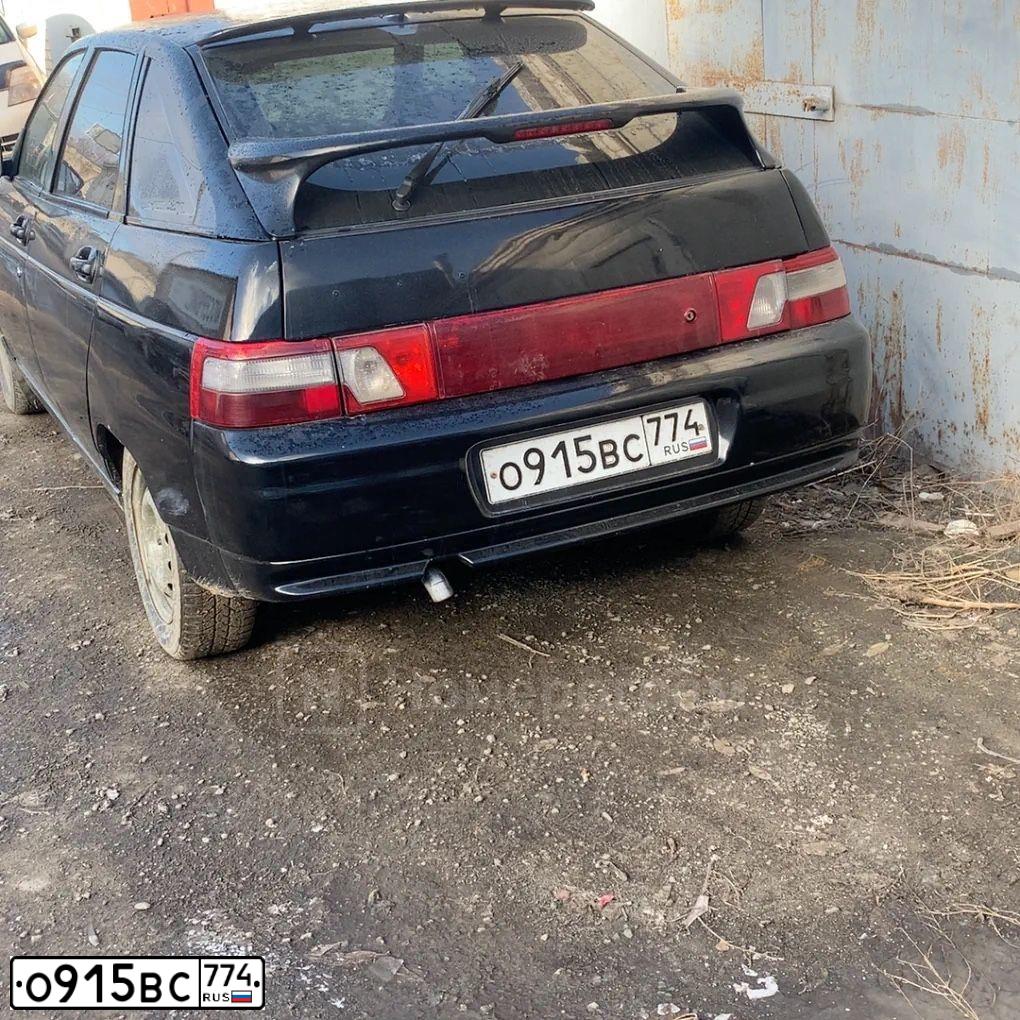 Фото автомобиля LADA 2112 LADA, 2007 — госномер О915ВС774. Цвет: ЧЕРНО-СИНИЙ