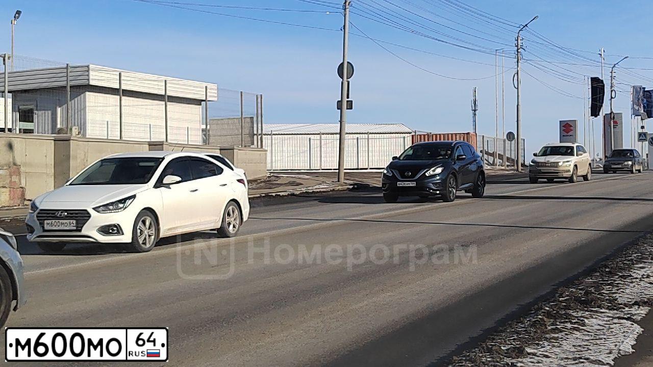 Фото автомобиля LADA 2112, 2006 — госномер М219ХЕ05. Цвет: БЕЛЫЙ