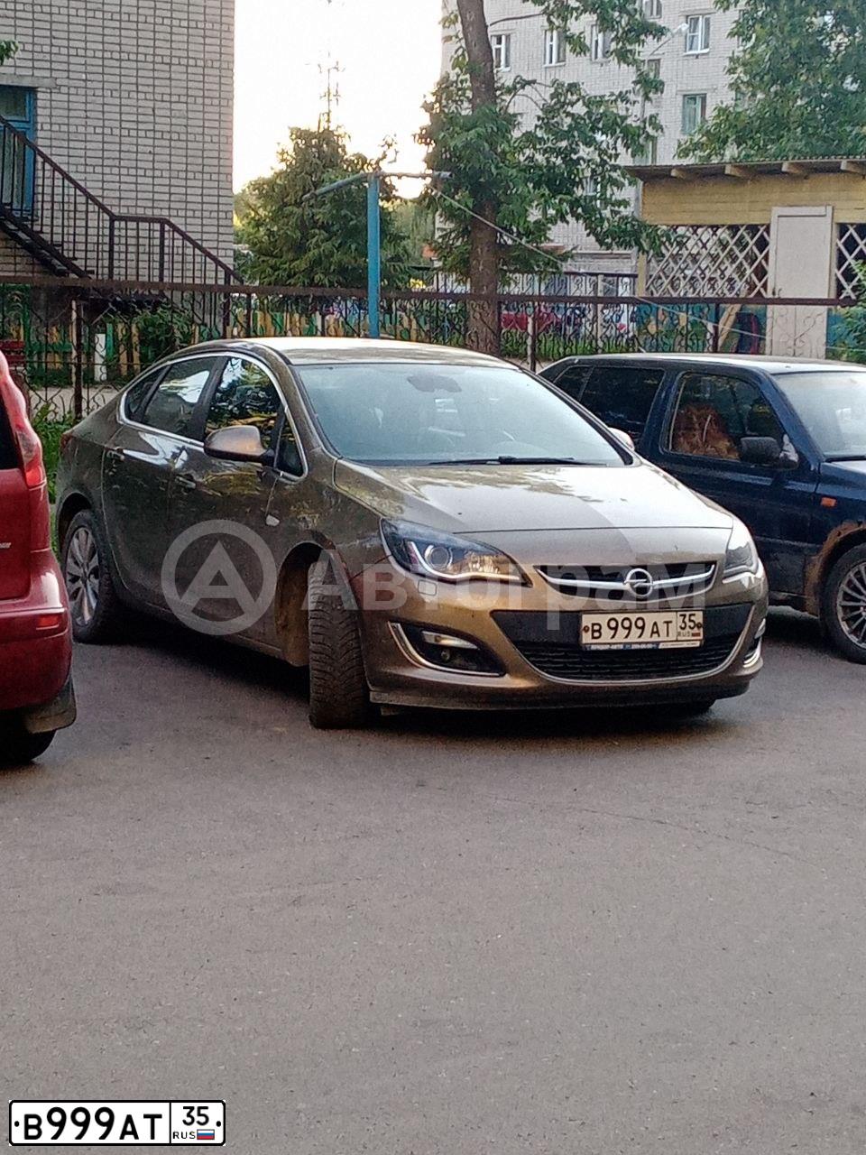 Фото автомобиля OPEL ASTRA, 2012 — госномер О669УХ29. Цвет: БЕЖЕВЫЙ
