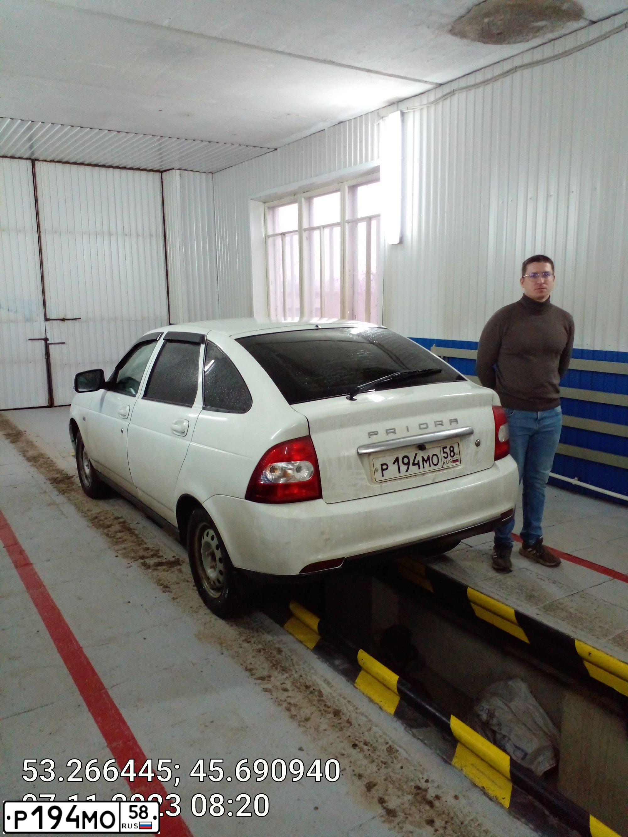 Фото автомобиля LADA 2172 PRIORA, 2011 — госномер Т026РМ58. Цвет: Белый
