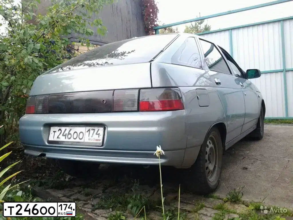 Фото автомобиля LADA 2112, 2003 — госномер Т246ОО174. Цвет: ЗОЛОТИСТО-СЕРЫЙ