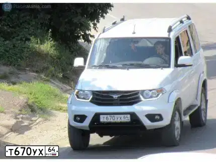 Фото автомобиля UAZ 3163 PATRIOT, 2015 — госномер С826НУ58. Цвет: АРКТИКА