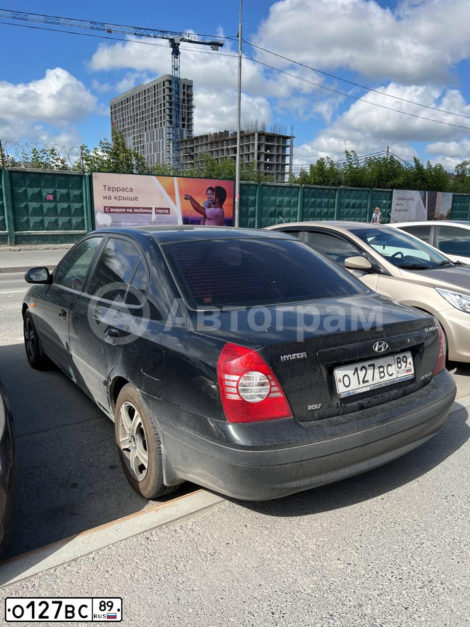 Фото автомобиля HYUNDAI ELANTRA, 2006 — госномер О127ВС89. Цвет: ЧЕРНЫЙ