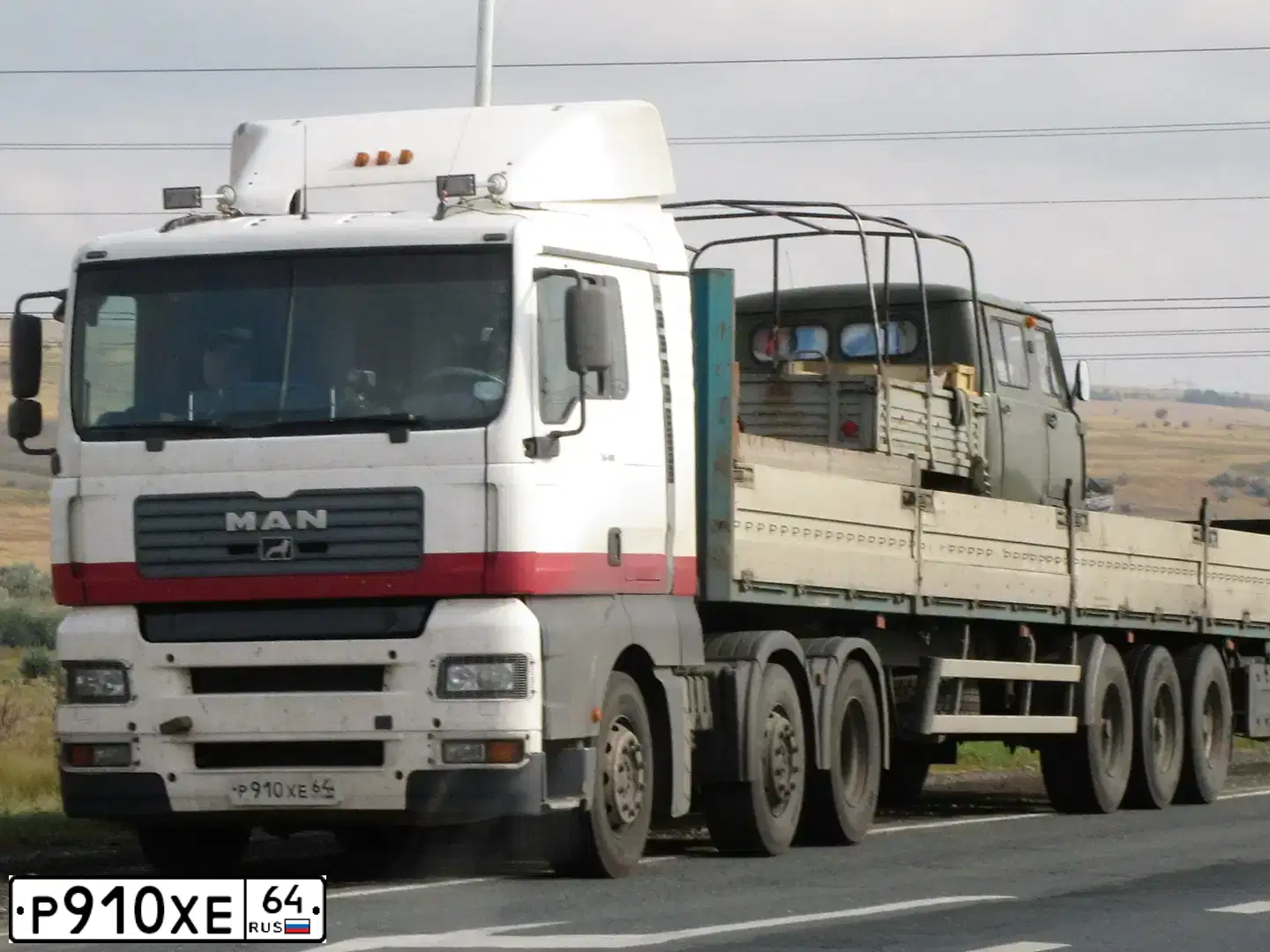 Фото автомобиля MAN TGA 18.XXX /4X2/, 2001 — госномер Р910ХЕ64. Цвет: БЕЛЫЙ