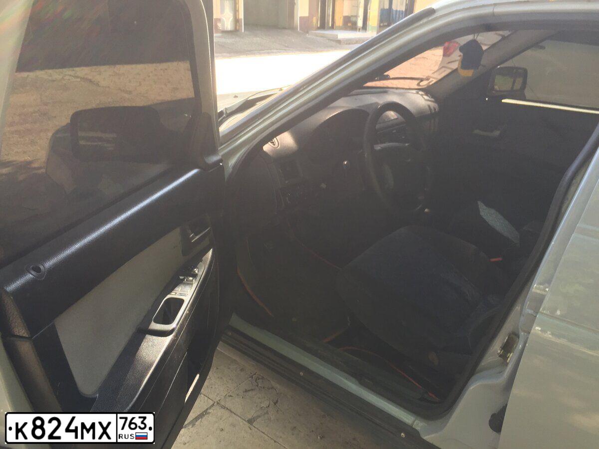 Фото автомобиля LADA 2170 PRIORA, 2010 — госномер Е812НТ763. Цвет: СВЕТЛО-СЕРЫЙ