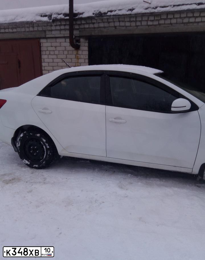 Фото автомобиля KIA CERATO, 2012 — госномер К348ХВ10. Цвет: Белый