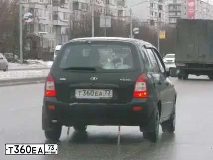 Фото автомобиля LADA 1117 KALINA, 2010 — госномер Т360ЕА73. Цвет: ЧЕРНЫЙ