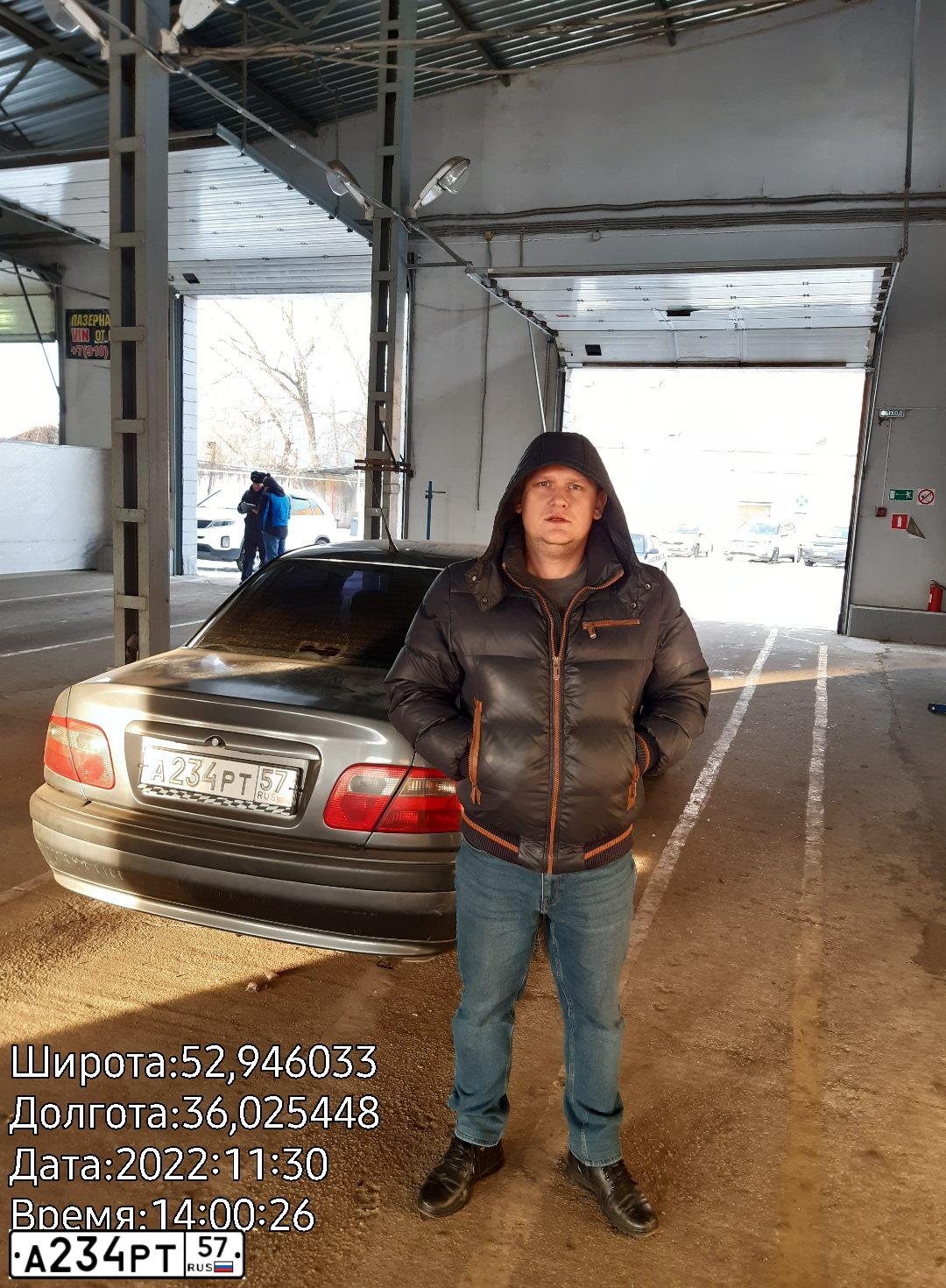 Фото автомобиля MITSUBISHI CARISMA, 2002 — госномер О856ТО71. Цвет: Серый