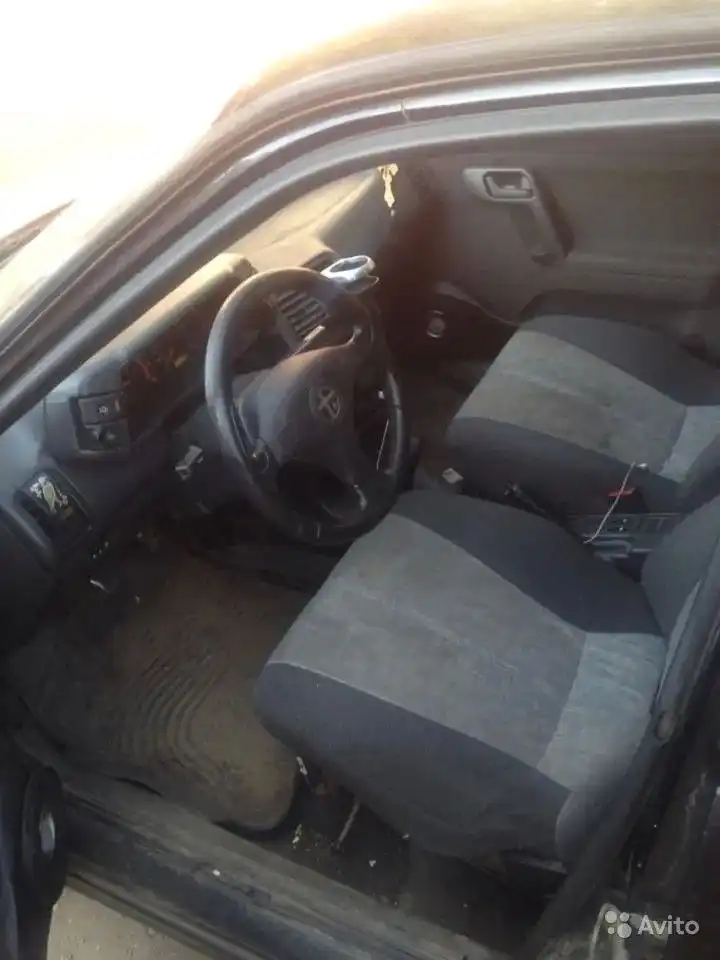Фото автомобиля LADA 2110 LADA, 2003 — госномер Е311МТ136. Цвет: ЧЕРНЫЙ
