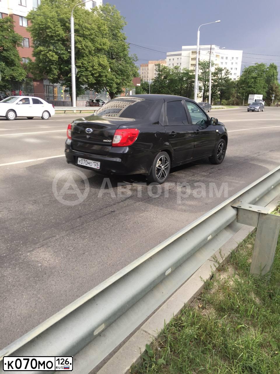 Фото автомобиля DATSUN ON-DO, 2015 — госномер Р234ЕХ126. Цвет: ЧЕРНЫЙ