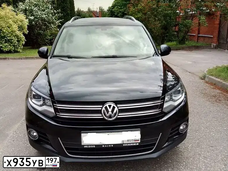 Фото автомобиля VOLKSWAGEN TIGUAN, 2012 — госномер Х935УВ197. Цвет: ЧЕРНЫЙ