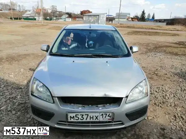 Фото автомобиля FORD FOCUS, 2006 — госномер М537НХ174. Цвет: СЕРЕБРИСТЫЙ