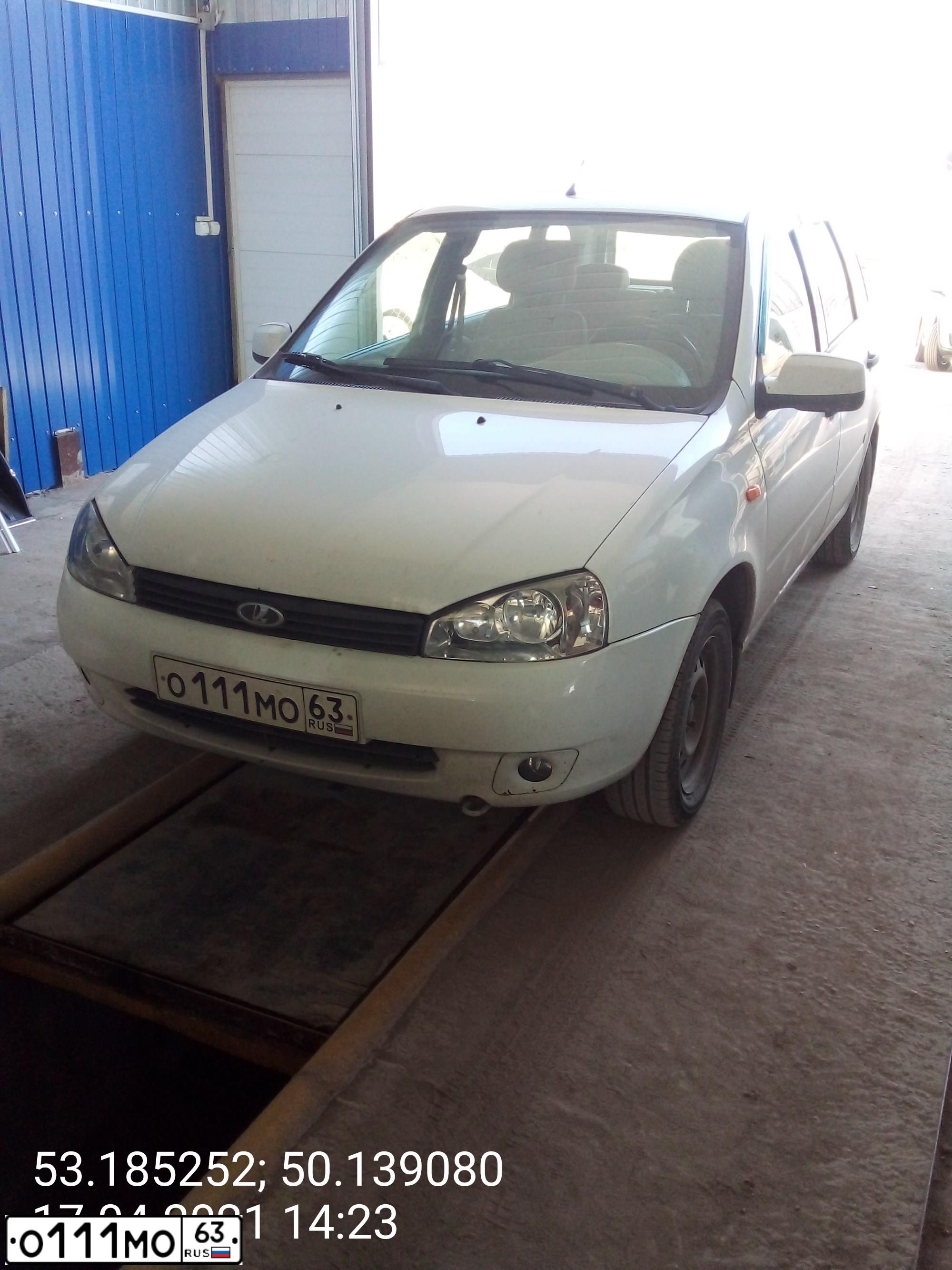 Фото автомобиля LADA 1117 KALINA, 2012 — госномер О111МО63. Цвет: БЕЛЫЙ