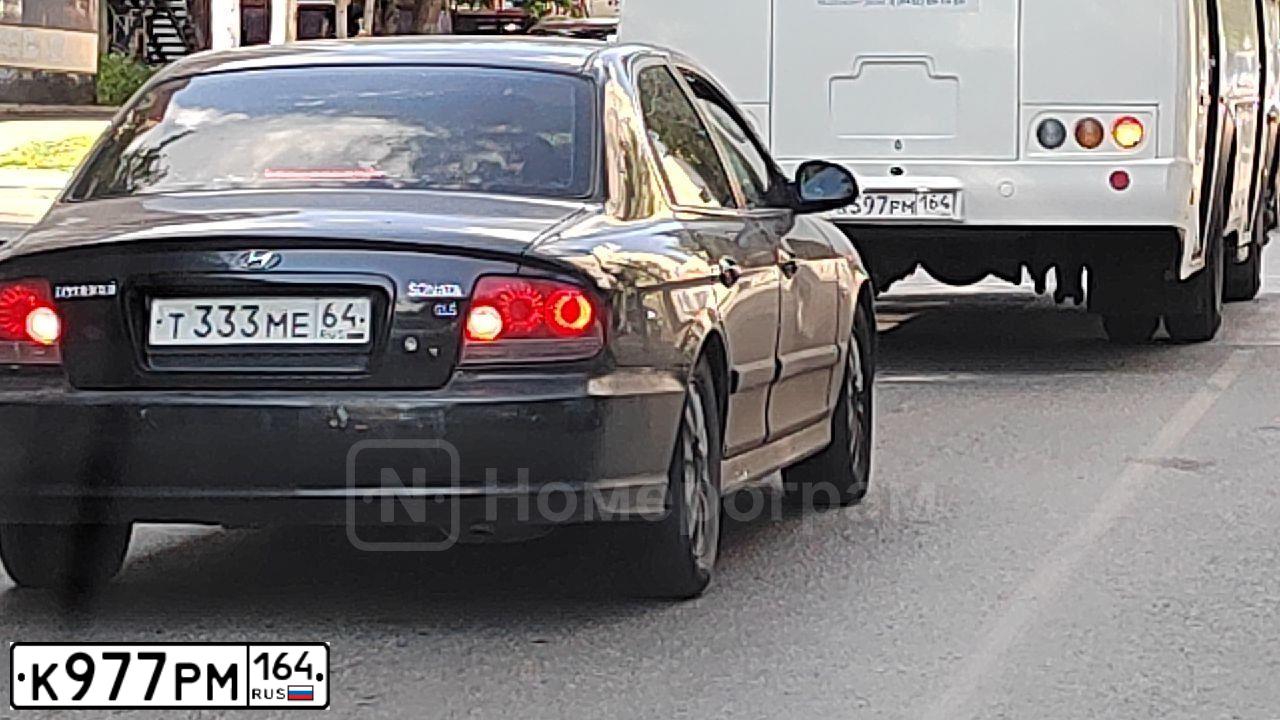 Фото автомобиля LADA 2109 SAMARA, 1997 — госномер К400НТ164. Цвет: ЗЕЛЕНЫЙ