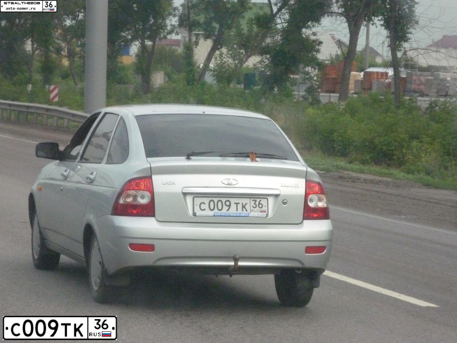 Фото автомобиля HYUNDAI GRAND STAREX, 2009 — госномер С009ТК36. Цвет: Белый