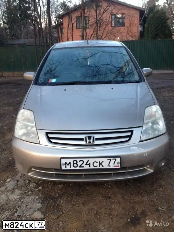 Фото автомобиля HONDA STREAM, 2001 — госномер Н806ОУ124. Цвет: ЖЕЛТЫЙ ЗОЛОТИСТЫЙ