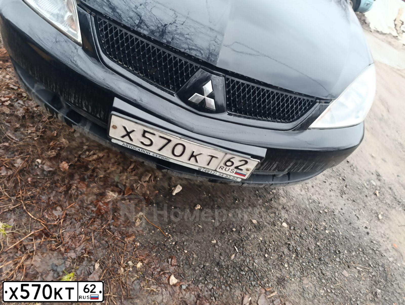 Фото автомобиля MITSUBISHI LANCER, 2007 — госномер Х570КТ62. Цвет: ЧЕРНЫЙ