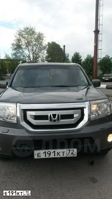 Фото автомобиля HONDA PILOT, 2008 — госномер Е066ОХ186. Цвет: СЕРЫЙ