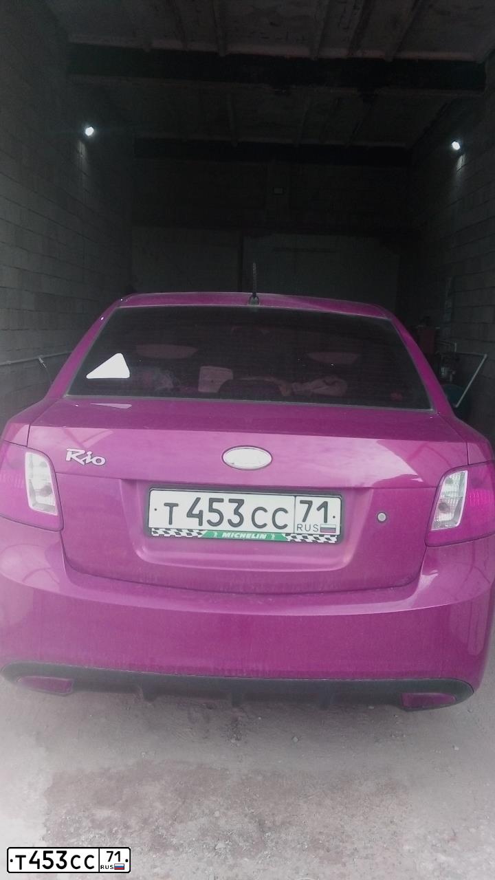 Фото автомобиля KIA RIO, 2009 — госномер К599СУ71. Цвет: Красный