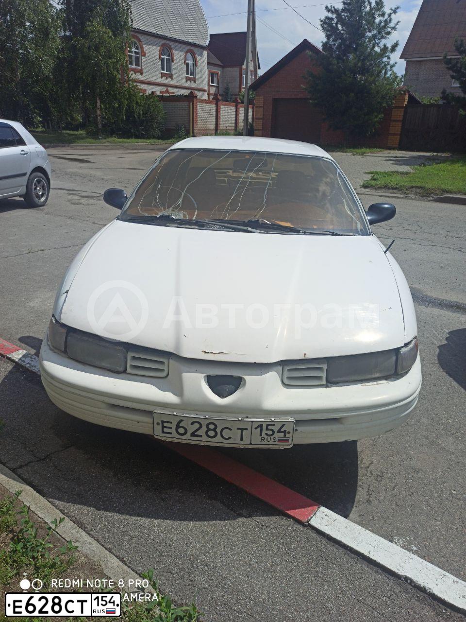 Фото автомобиля DODGE INTREPID, 1993 — госномер Е628СТ154. Цвет: БЕЛЫЙ