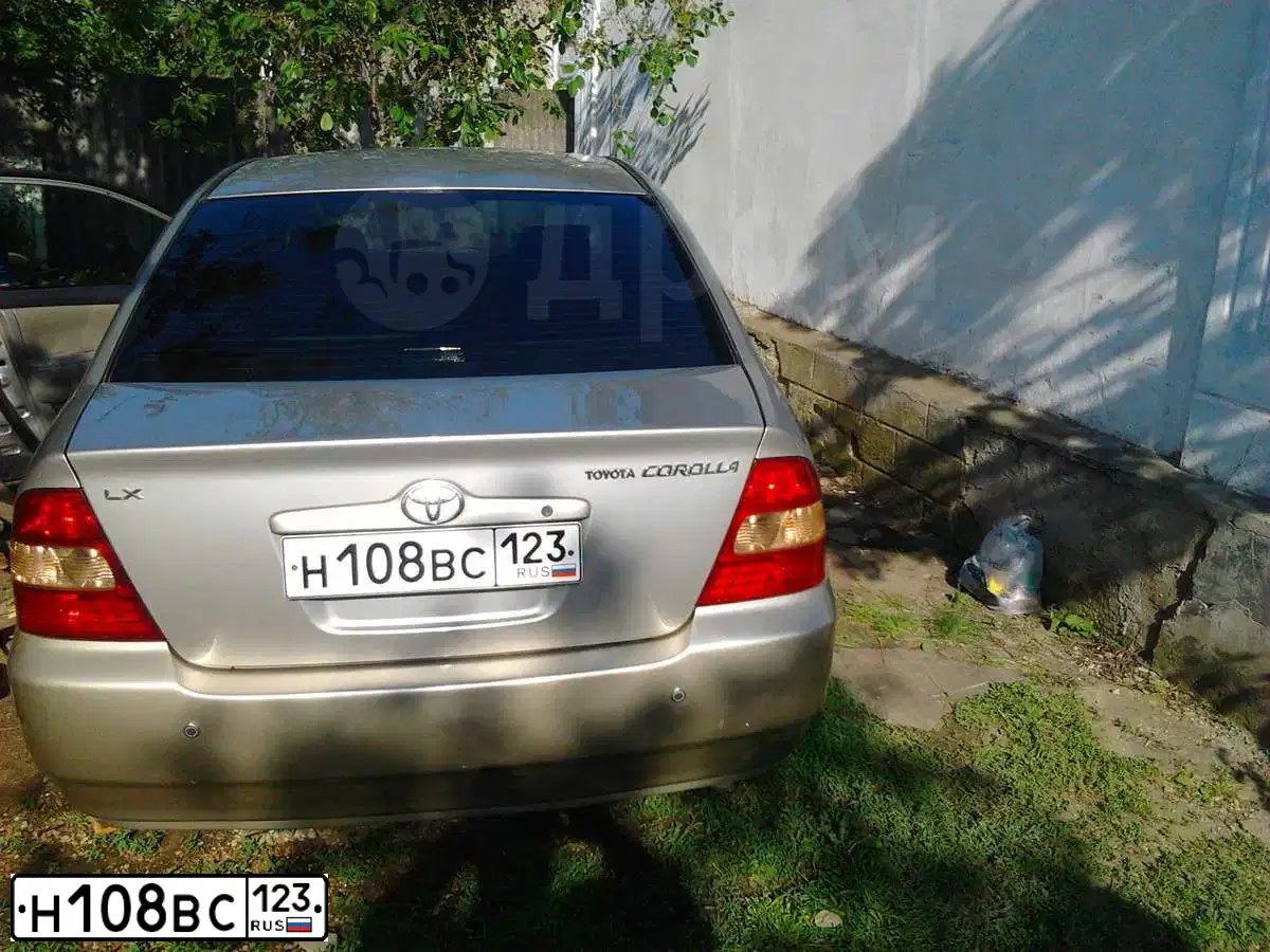 Фото автомобиля TOYOTA COROLLA, 2001 — госномер Н108ВС123. Цвет: ЗОЛОТИСТЫЙ