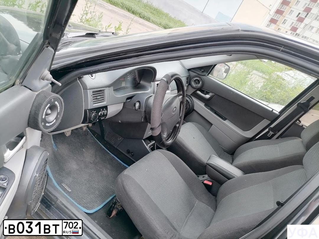 Фото автомобиля LADA 2172 PRIORA, 2010 — госномер В031ВТ702. Цвет: СИНЕ-ЧЕРНЫЙ