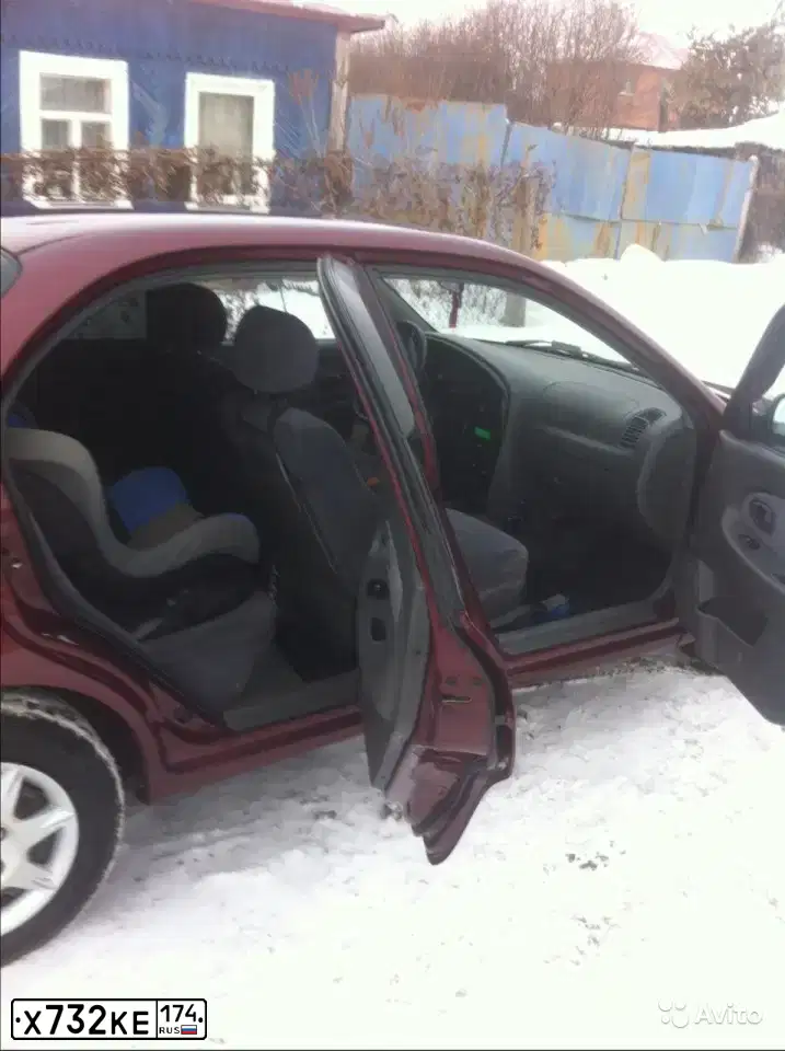 Фото автомобиля KIA SPECTRA, 2006 — госномер Е942ОЕ45
