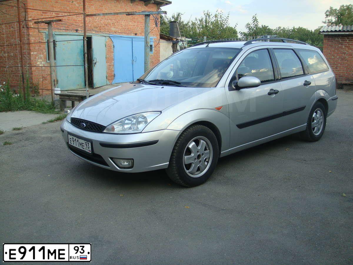 Фото автомобиля FORD D FOCUS, 2002 — госномер Е911МЕ93. Цвет: БЕЛЫЙ (СЕРЕБРИСТЫЙ)