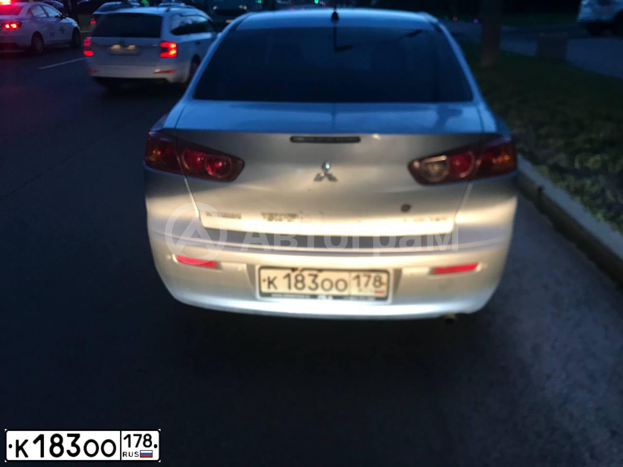 Фото автомобиля MITSUBISHI LANCER, 2007 — госномер К183ОО178. Цвет: СЕРЕБРИСТЫЙ